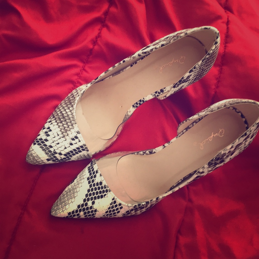 Snake print. Heels size 6